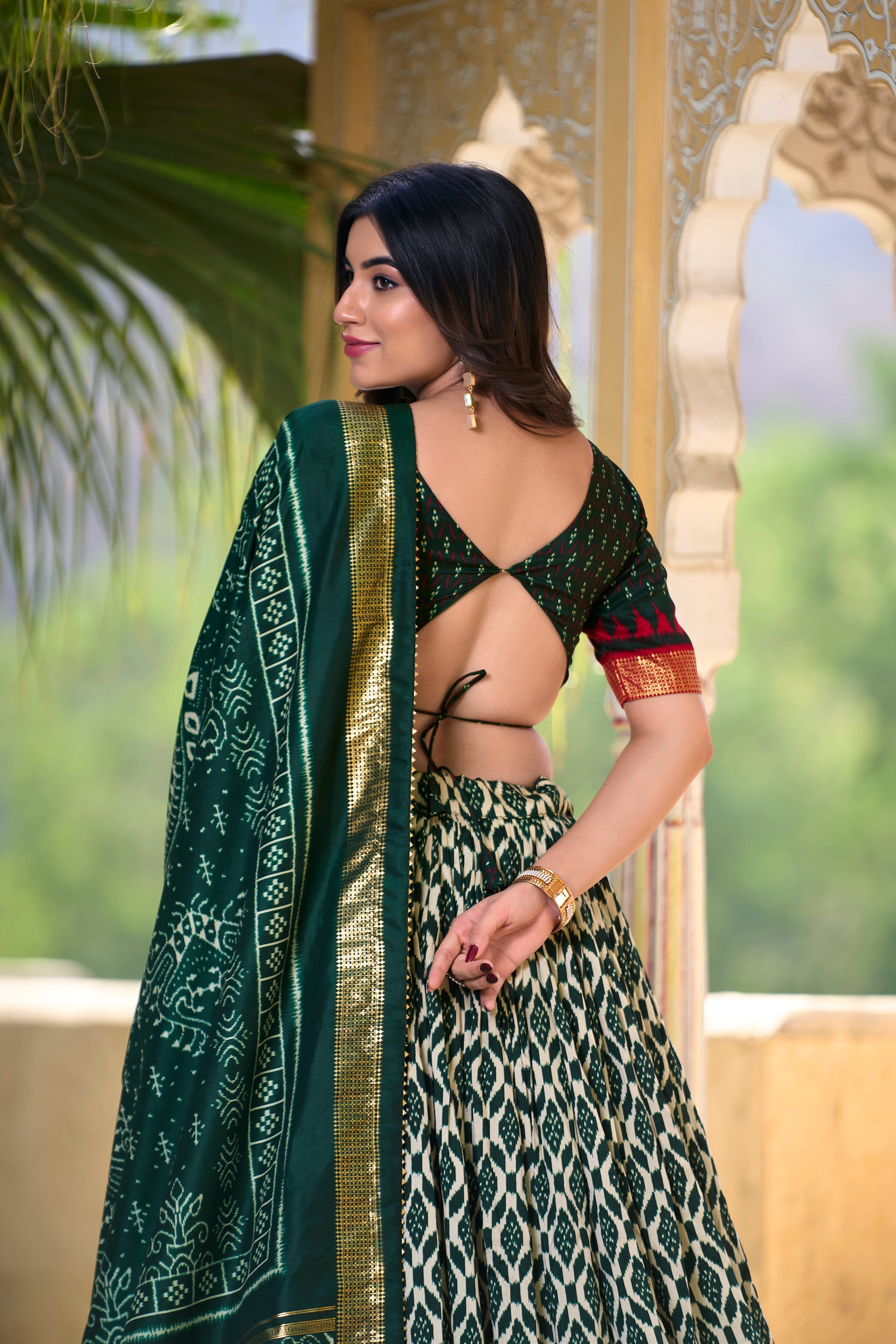 Patola Printed Tussar Silk Lehenga in Dark Green