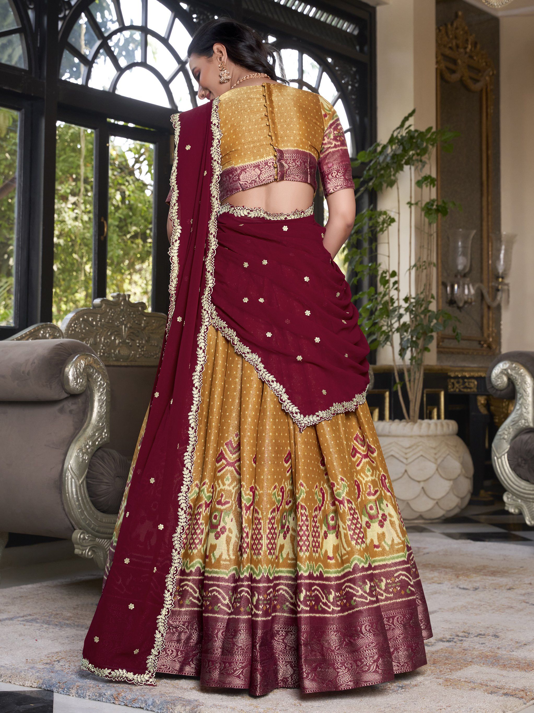 Captivating Mustard Yellow Silk Ikat Print Festive Wear Lehenga Choli