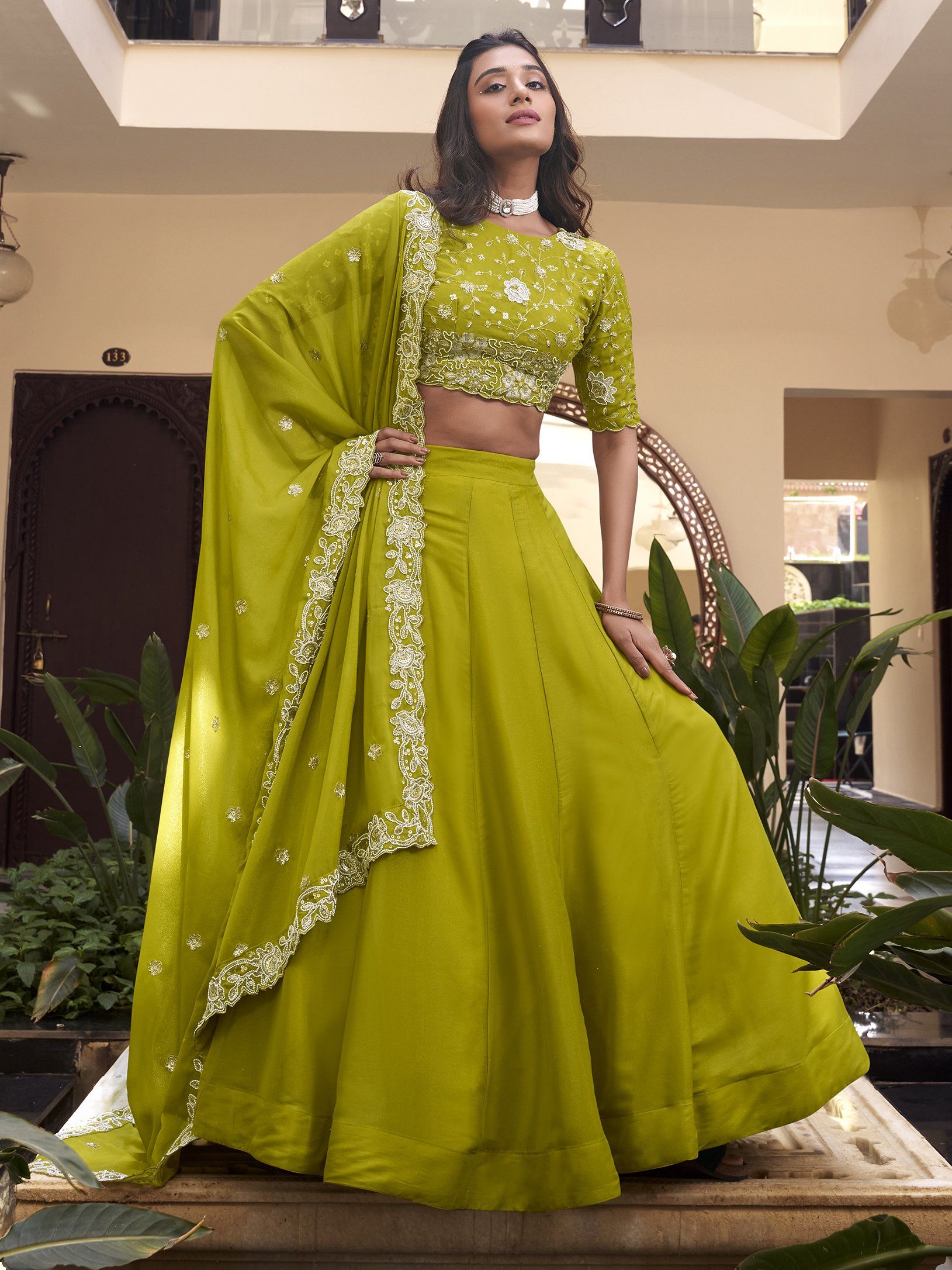 Fantabulous Parrot Green Georgette Sequins Mehendi Wear Lehenga Choli