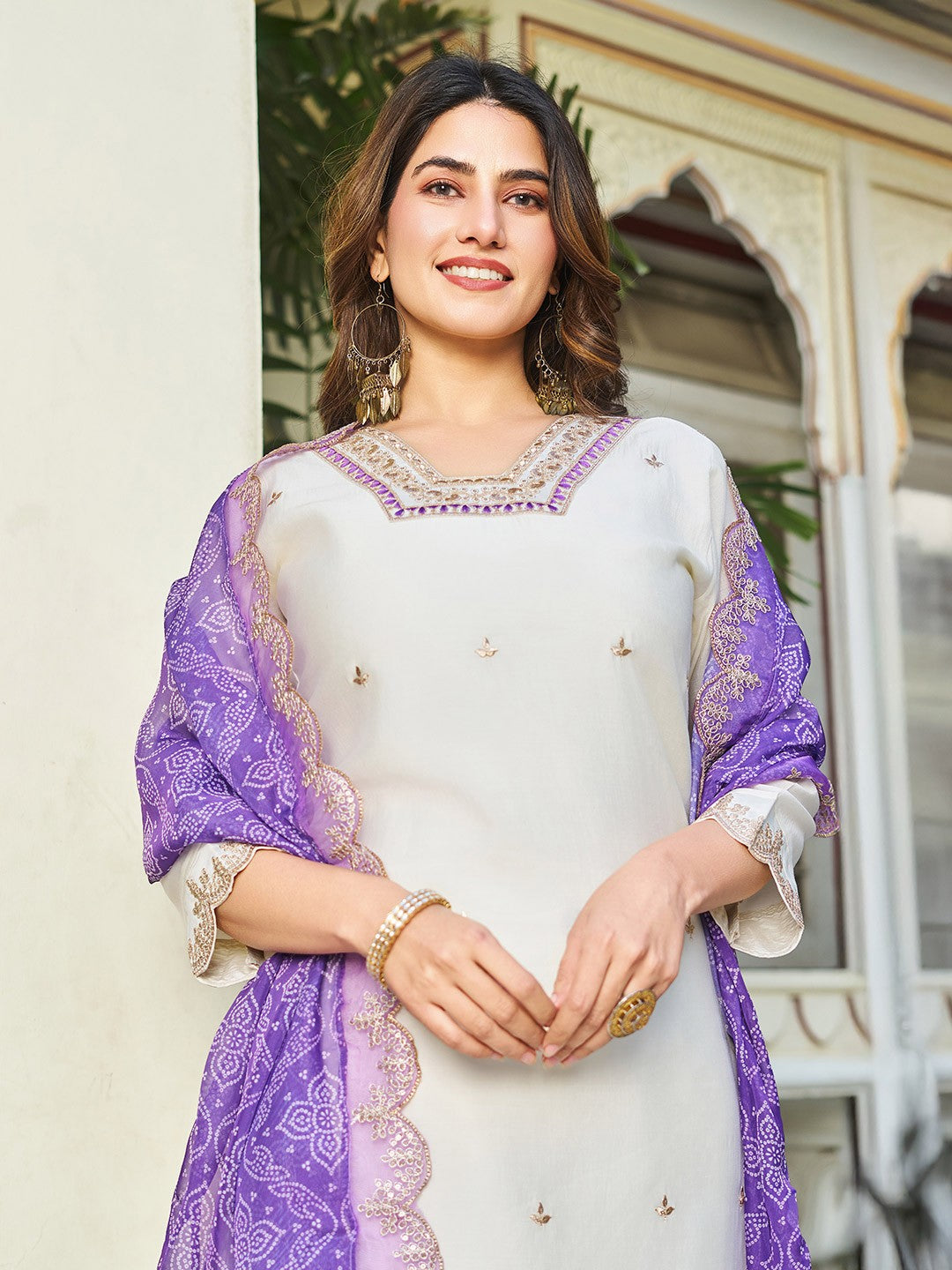 Roman Silk Cream Kurta with Pant and Bandhani Printed with Heavy Embroidered Sequence Work Lace Border Dupatta Sets